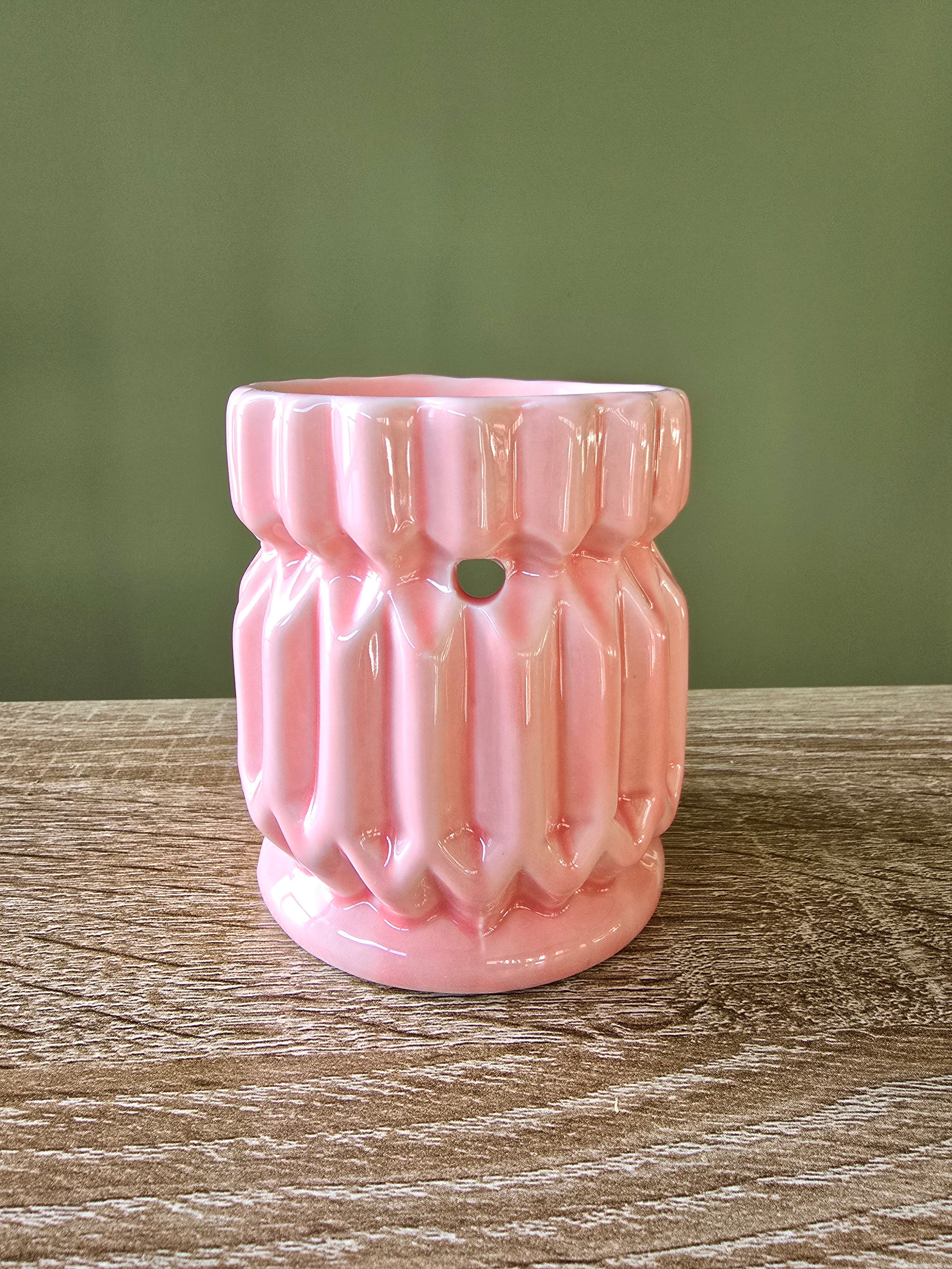 céramique à utiliser avec un fondant parfumé. Vendu par Anoki.